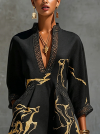 Minivestido negro con estampado de mármol dorado y encaje de ganchillo